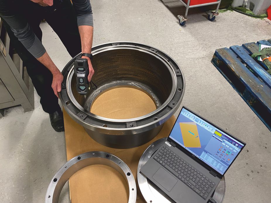 Special 800 mm diameter cast iron bellhousing being inspected using our new Keyence XM-5000 handheld CMM system.